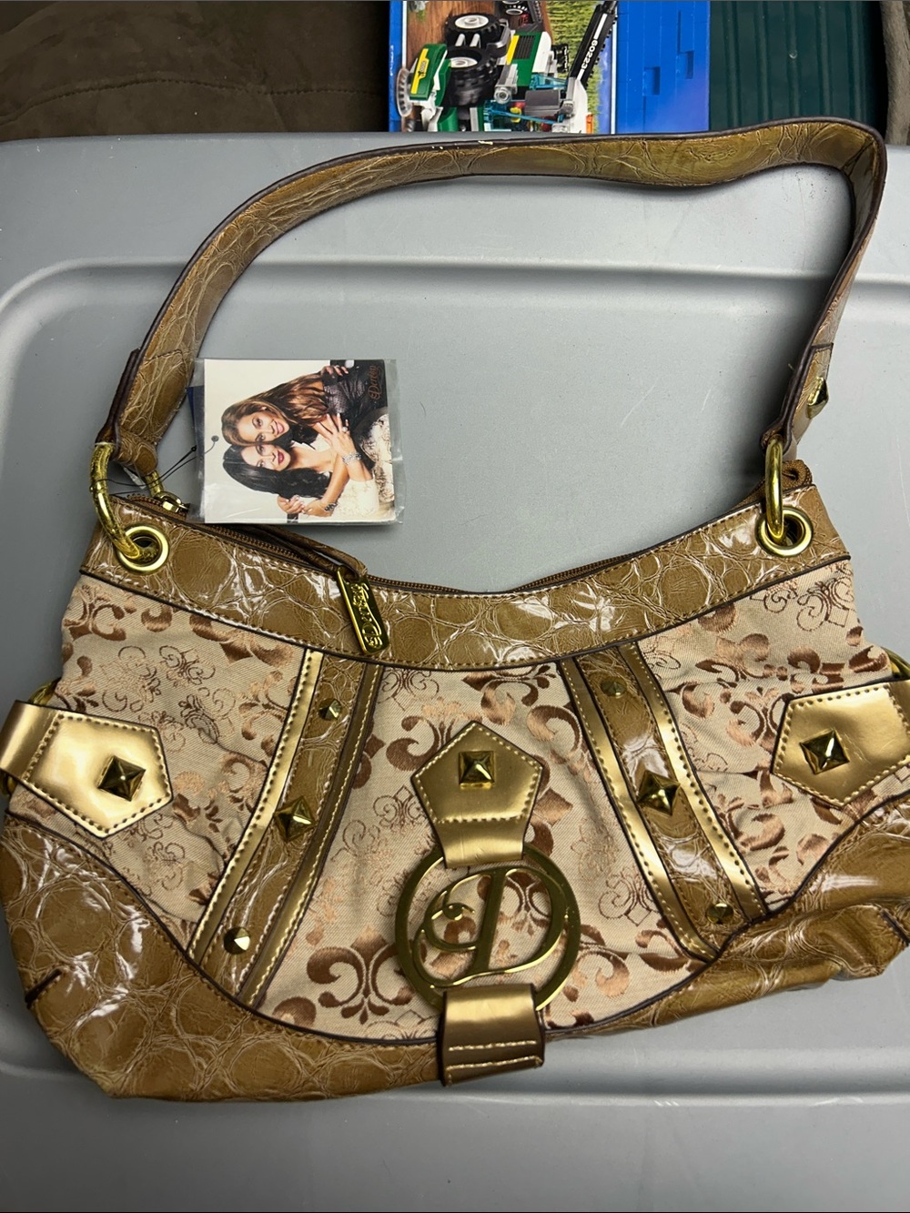Dereon Gold-Tone Accent Floral Jacquard Shoulder Bag. (Tidal Wave)